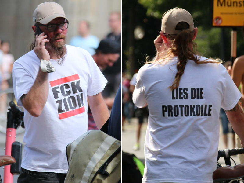 Werbung für die antisemitische Hetzschrift »Protokolle der Weisen des Zion« auf der Demonstration gegen die Maßnahmen zur Eindämmung der Corona-Pandemie am 01. August 2020 in Berlin.