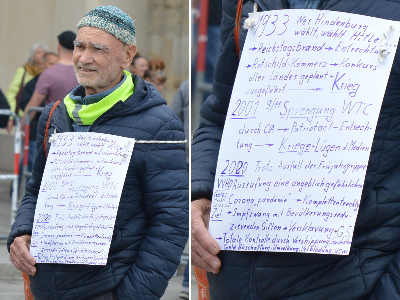 Die Geschichte der Verschwörungen, die auf diesem Schild zu lesen ist, reicht vom Reichstagsbrand über die »Rothschilds« (auf dem Schild »Rotschild« geschrieben) und den Anschlägen vom 9. September 2001 bis hin zur Impfpflicht, zur COVID-19-Pandemie, zum Ausbau des 5G-Mobilfunknetzes (hier »G5« geschrieben) und zur angeblichen »Umvolkung«. Dafür werden »Gates, Merkel, Soros« verantwortlich gemacht.